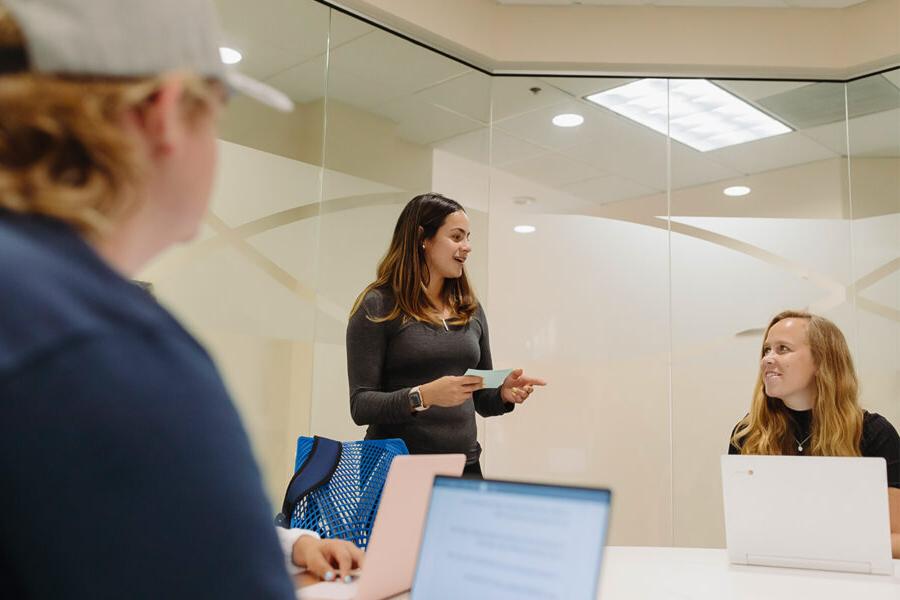 students from the philosophy major study in the library