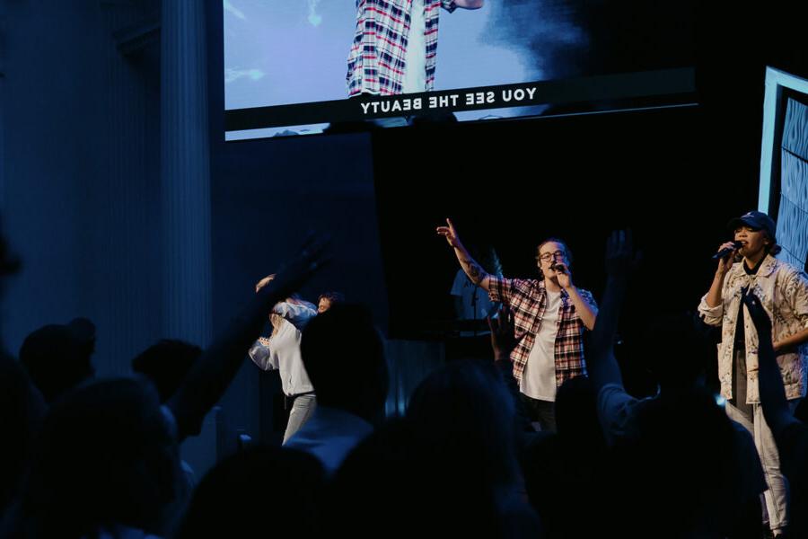 students from the worship leadership program sing on stage